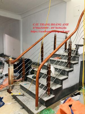 Mẫu cầu thang suốt inox 304 tay tròn vân gỗ cánh gián thi công tại bắc ninh