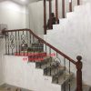 Báo giá cầu thang sắt tay gỗ tại hà nội