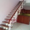 Cầu thang xương sắt mặt bậc gỗ