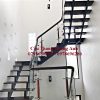 Cầu thang xương cá sử dụng sắt i đôi sơn màu đen sang trọng