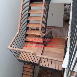 Mặt bậc gỗ lim cầu thang xương cá dầm đôi thi công tại hà nội